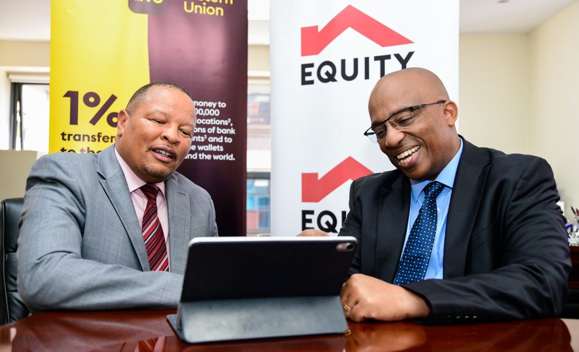 Equity Group Robert Kiboti (right) and Equity Bank Kenya Managing Director Gerald Warui