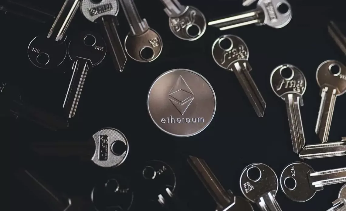 a bunch of keys in front of ethereum coin source https://unsplash.com/photos/iFYUdfD5zsE